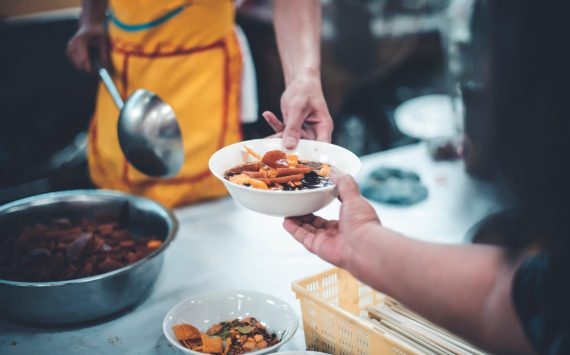 Concept of free food serving : Starvation issues help with food donations